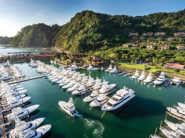 Los Sueños Marina and the green hills of the resort near Jaco, Costa Rica