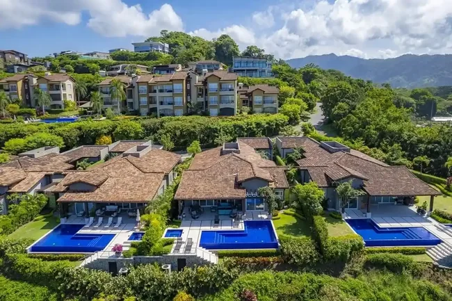 Aerial drone view of luxury coastal vacation rental in Los Sueños Costa Rica